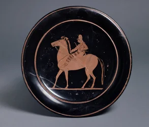 Attisch rotfiguriger Teller mit berittenem Bogenschützen, von Paseas, griechisch aus Chuisi, ca. 520-510 v. Chr.